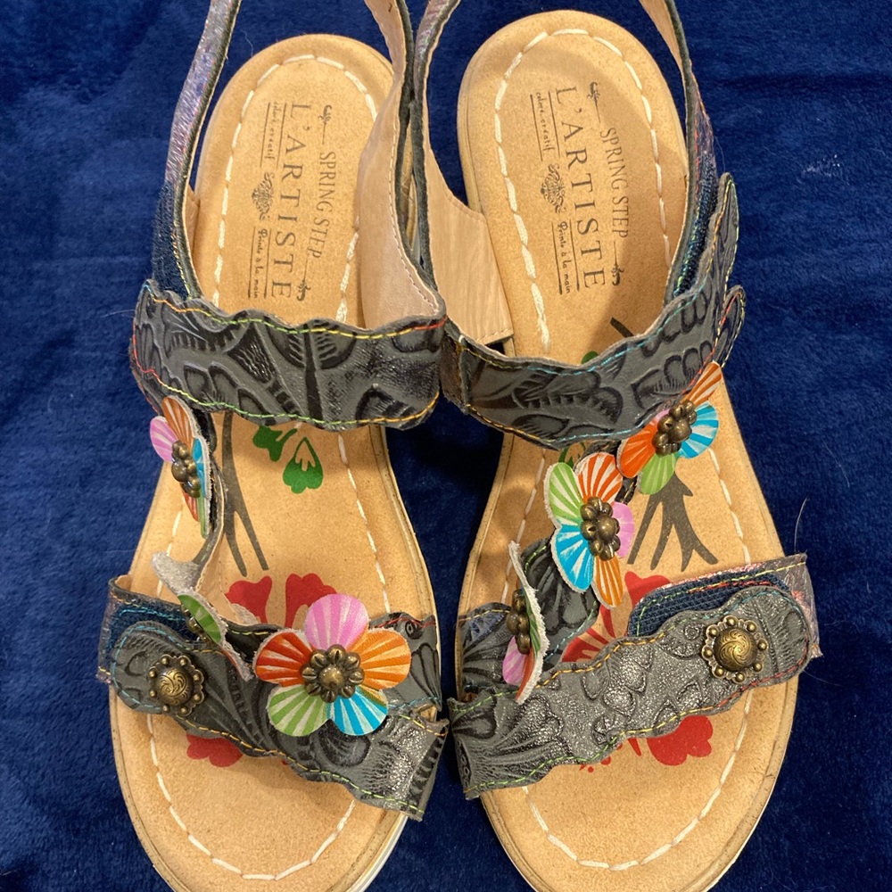 Beautiful feminine multi color leather sandals with 3 adjustable straps.